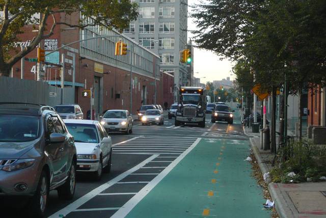 The new Kent Avenue bike lane in South Williamsburg. Naturally, drivers can't resist its siren call.